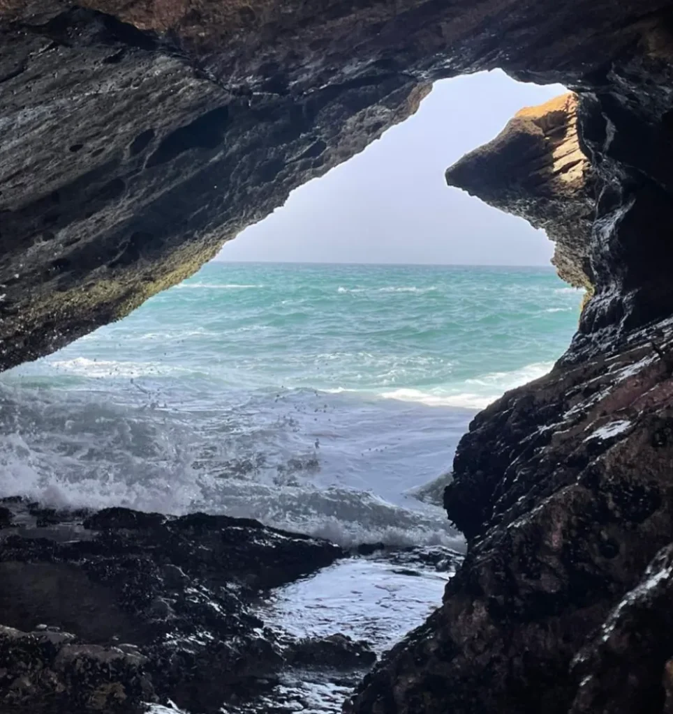 A view of the ocean from a cave. — Timlaline / Timlalin dunes quad tour photo, Agadir Morocco