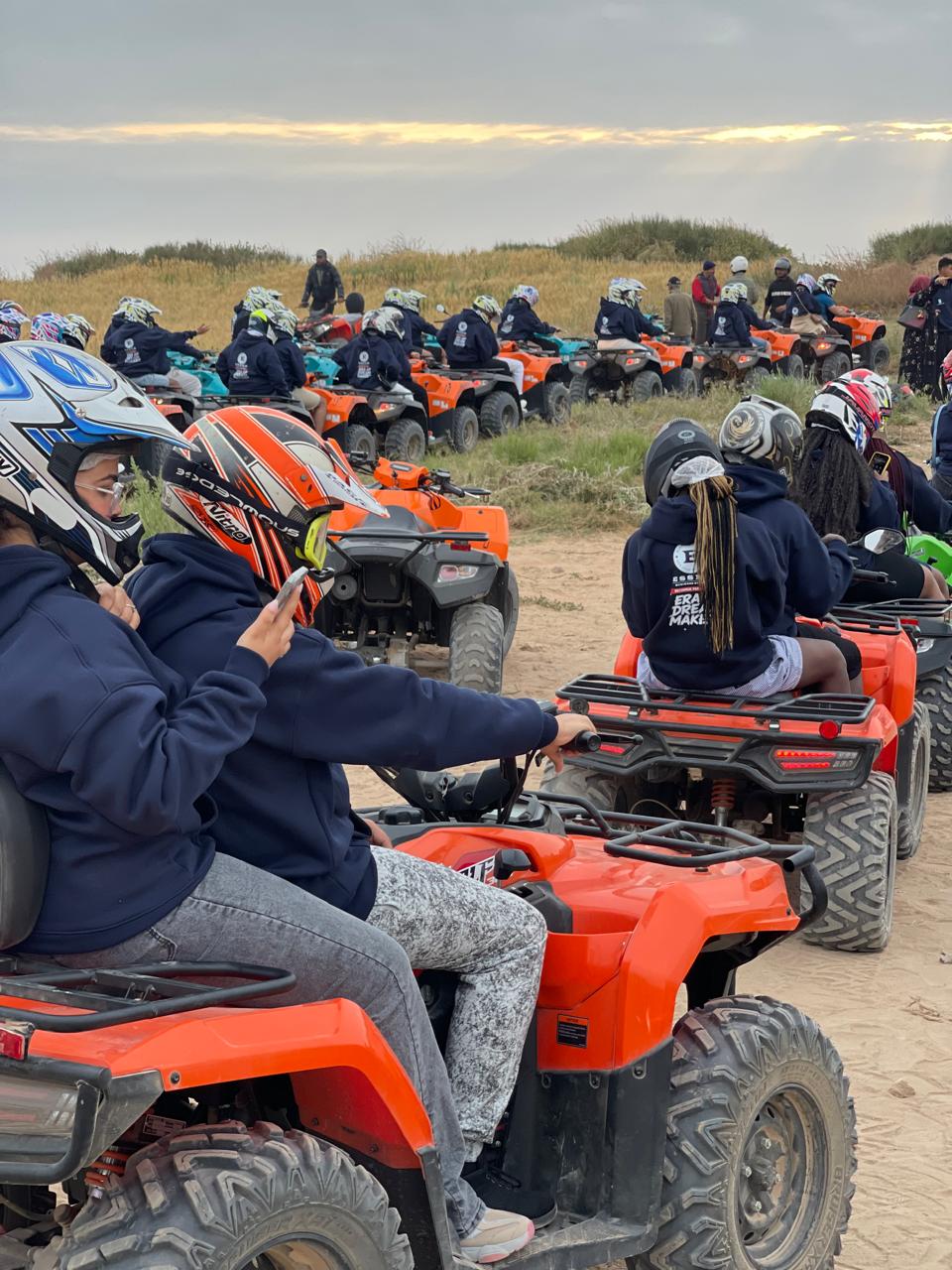 1-Hour Quad Bike Ride at Timlaline dunes near Agadir, Morocco — A group of people riding on quad bikes in the dunes.